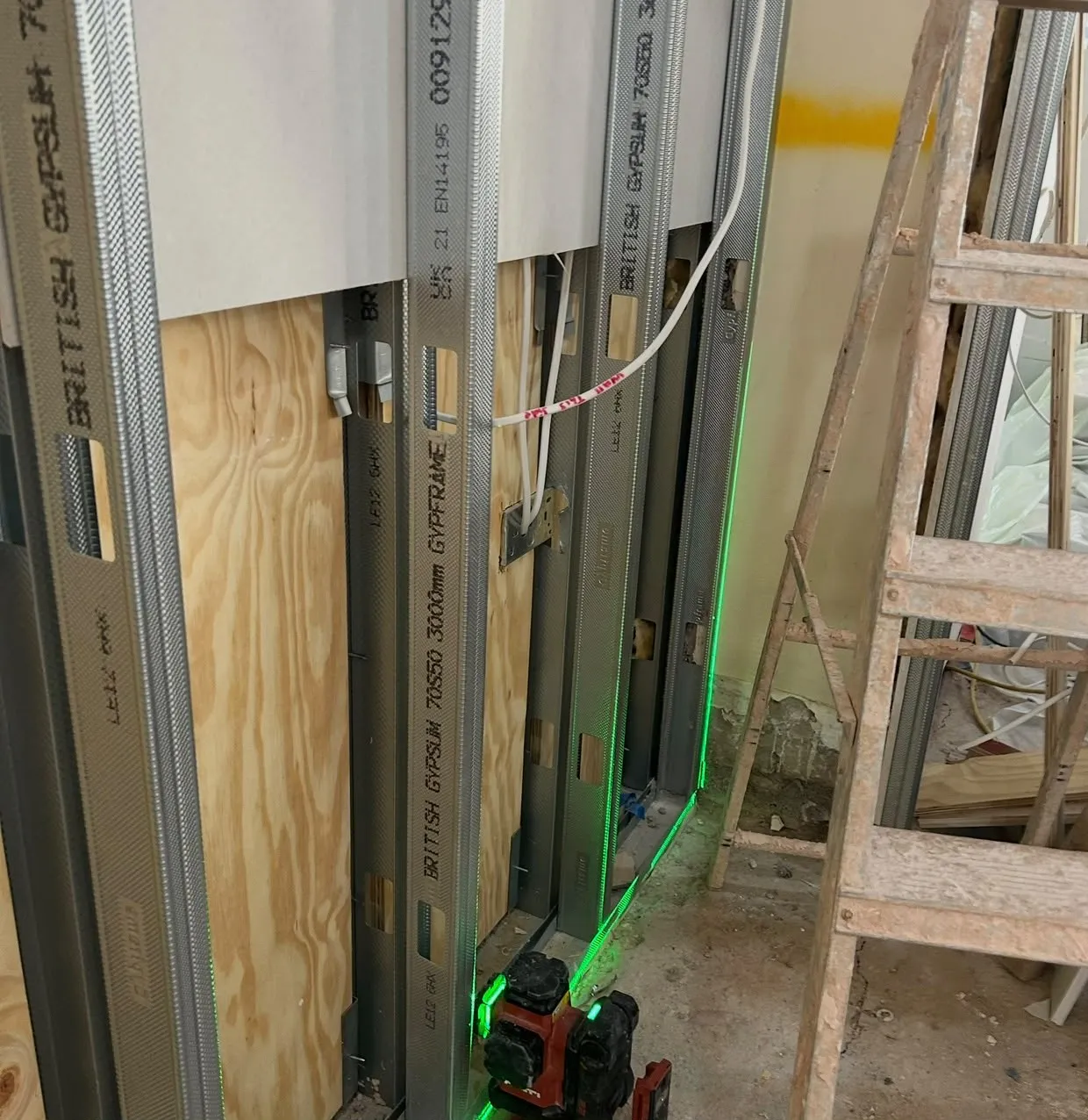 Laser set-out on studwork with plywood pattresses