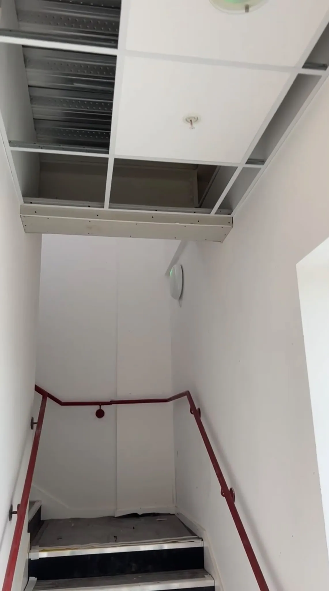 Stairwell ceiling grid during installation